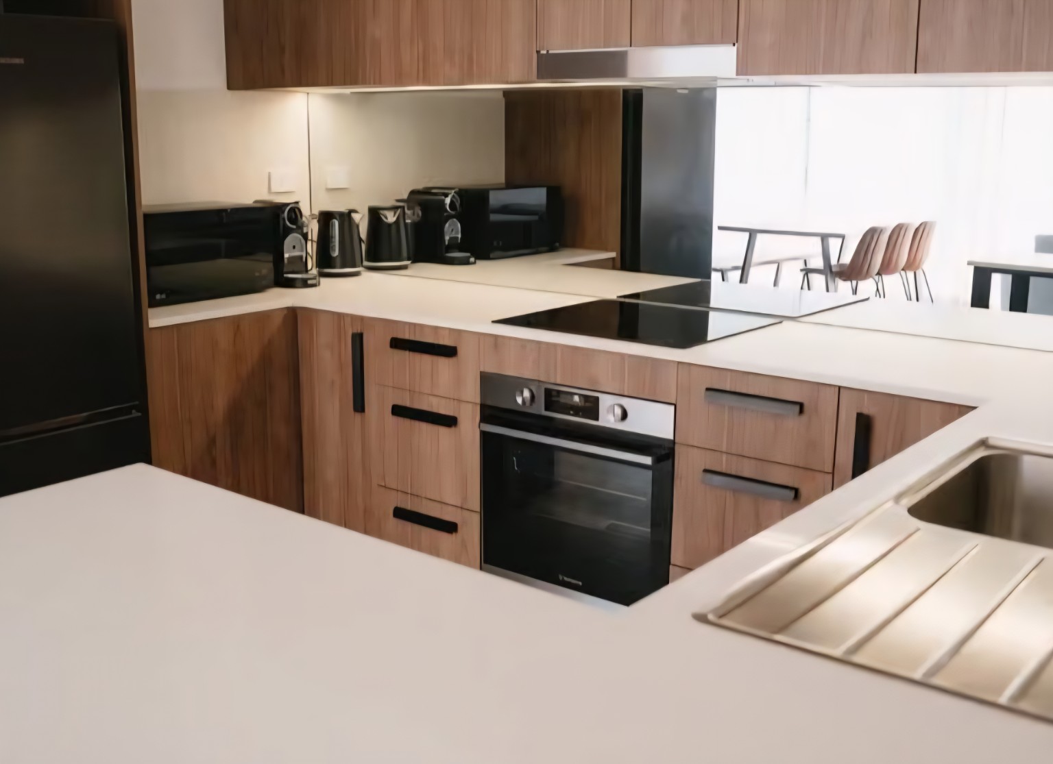 Finished timber kitchen with stone benchtops