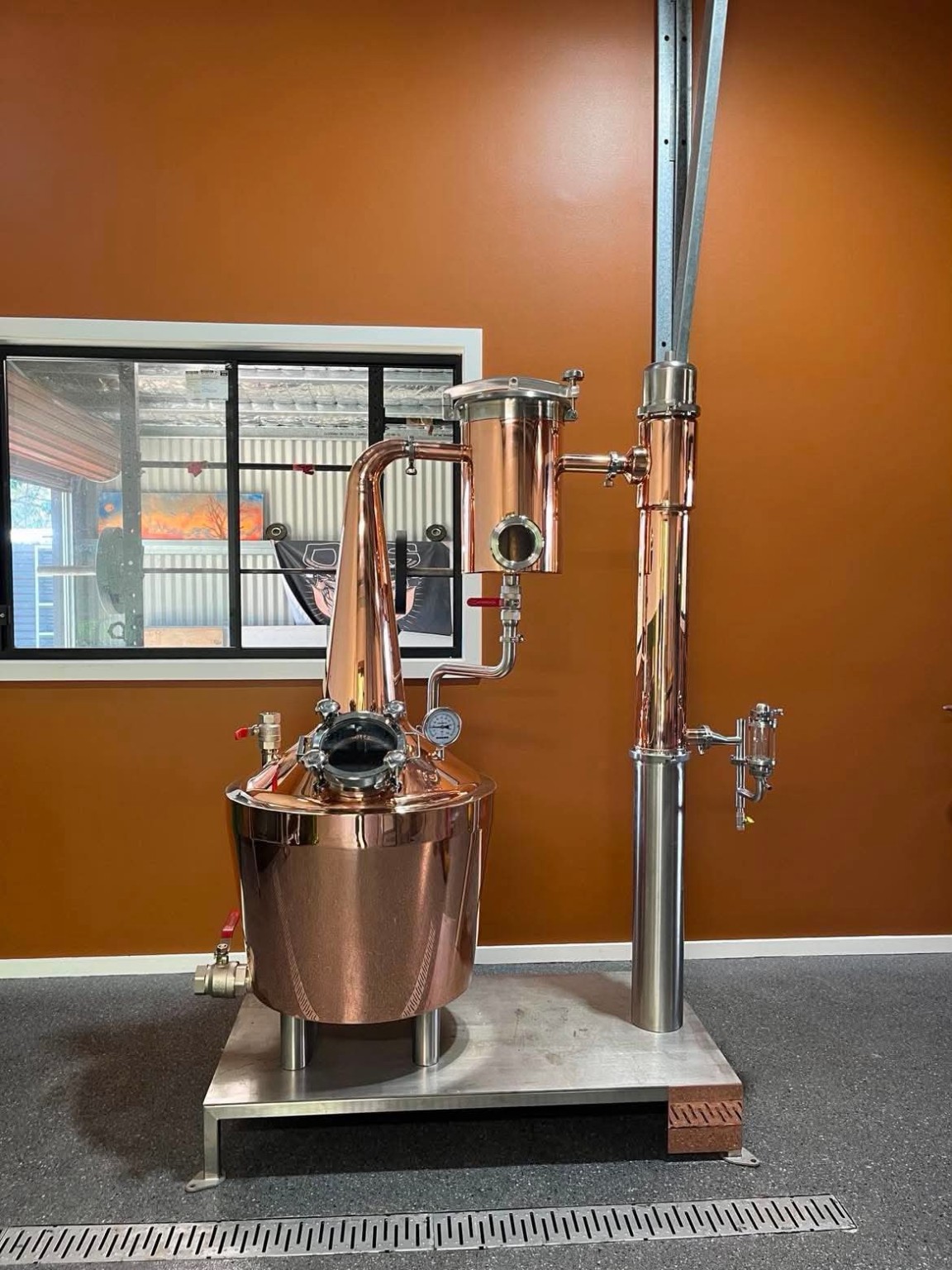 Copper still installed in the completed distillery