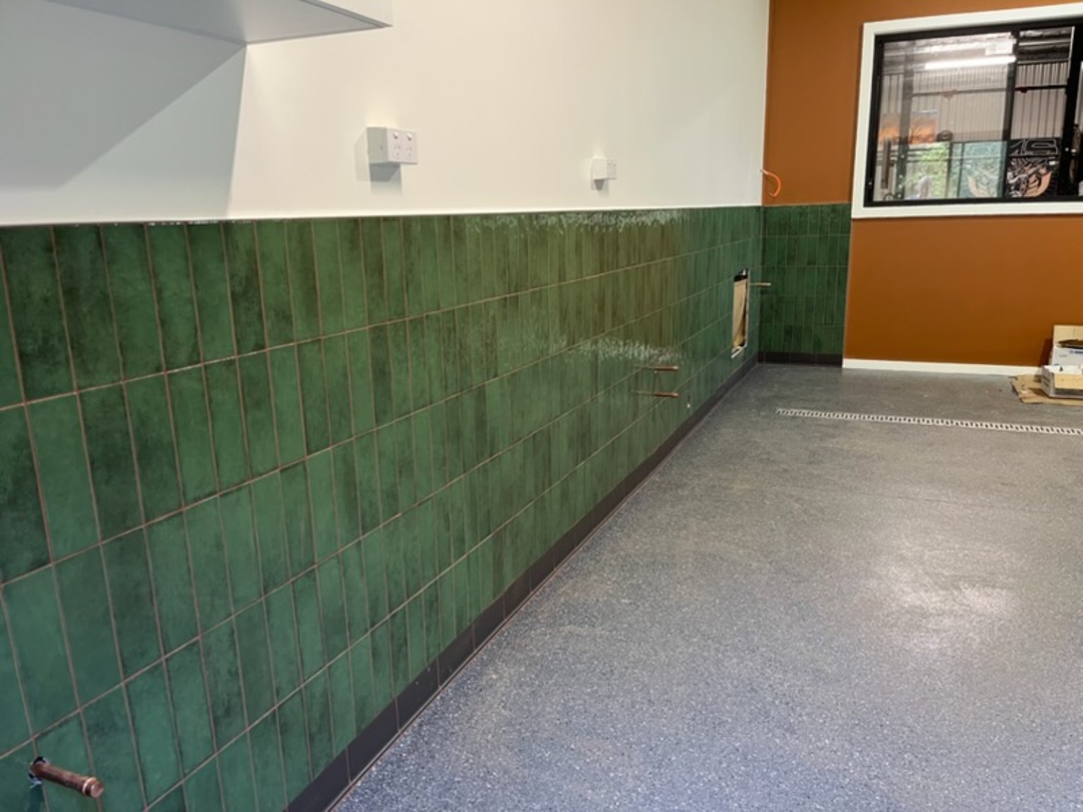 Green wall tiling in the distillery production area